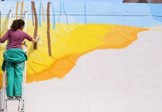 Del 27 de marzo al 1 de abril, la artista plasmará en un mural una versión de su proyecto ‘Viajando el Paraíso’.