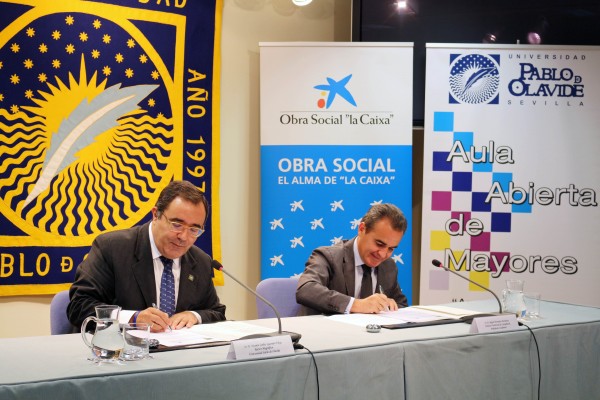 Vicente Guzmán y Rafael Herrador durante la firma del convenio